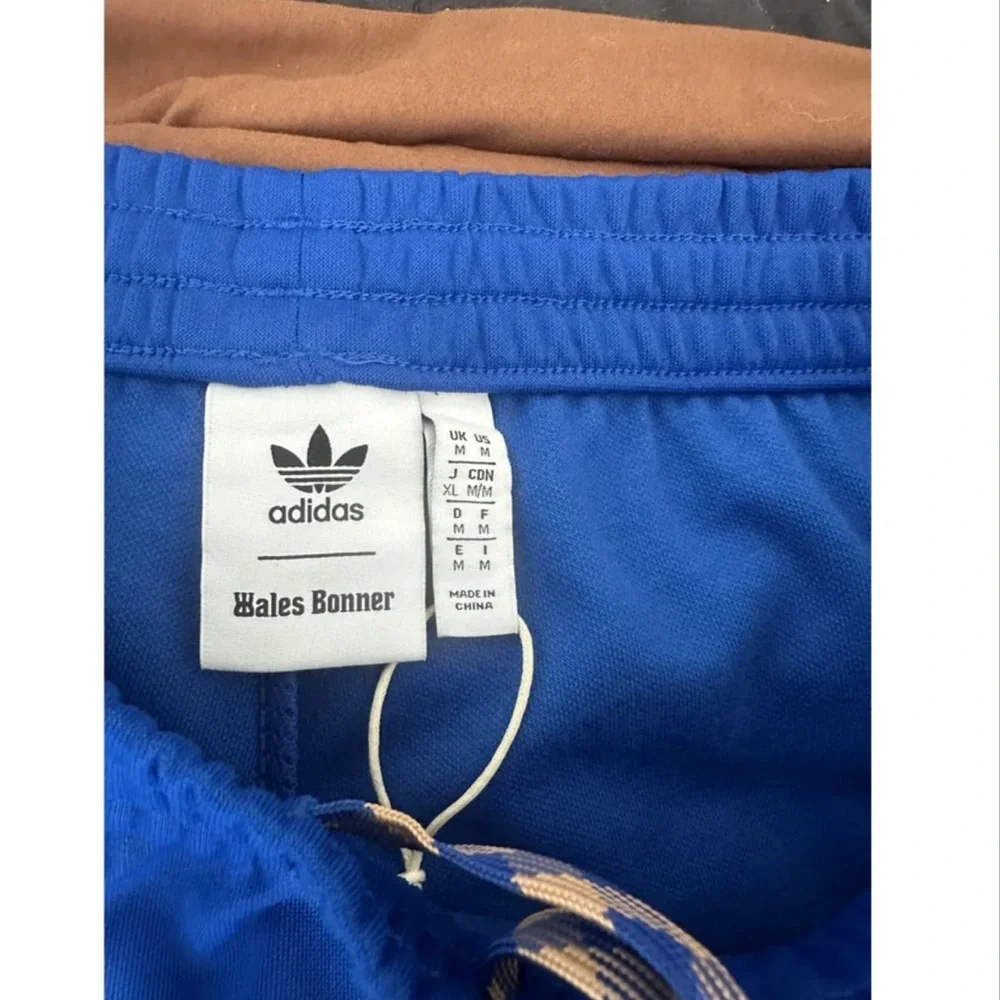 Adidas Wales Bonner Royal Blue Joggers with Vibrant Orange Stripes - Picture 3 of 3